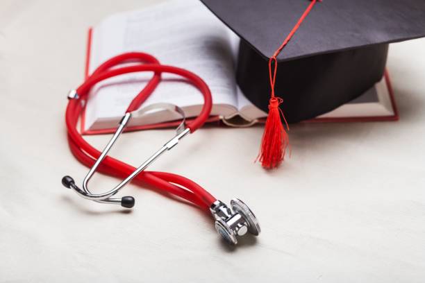 Stethoscope and graduate hat medical education graduate achievement adult background
